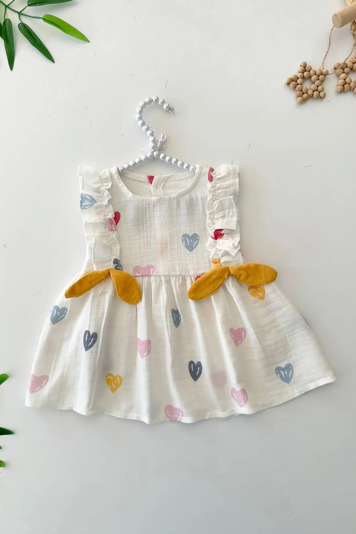 Miniğimin Cicileri Müslin Renkli Kalp Baskılı Fiyonklu Kız Bebe Elbise - Beyaz